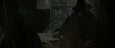 At a table sat a broken man, - The Happy Prince