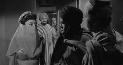 At least I know where to look for the medallion - Abbott and Costello Meet the Mummy