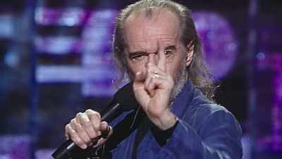-(AUDIENCE CHEERING, APPLAUDING)
-Racist game, racist game. - George Carlin's American Dream