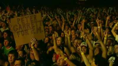 -[audience cheering]
-["Say Your Prayers" playing] - Midnight Oil: The Hardest Line