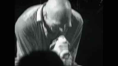 -[audience cheering]
-[screams] - Midnight Oil: The Hardest Line