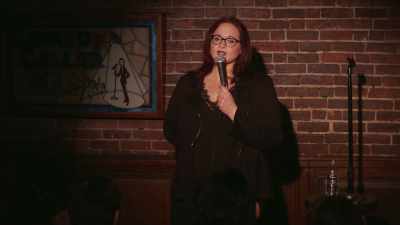 -[audience chuckles]
-[smacks lips] - Adrienne Iapalucci: The Dark Queen