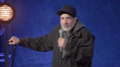 [audience chuckling] - Dave Attell: Hot Cross Buns