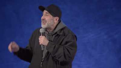 [audience chuckling] - Dave Attell: Hot Cross Buns