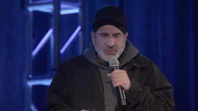 [audience laughing and cheering] - Dave Attell: Hot Cross Buns