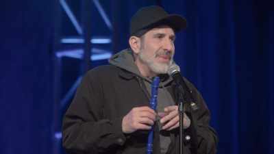 [audience laughing] - Dave Attell: Hot Cross Buns