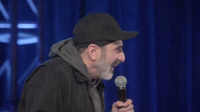 [audience laughing] - Dave Attell: Hot Cross Buns