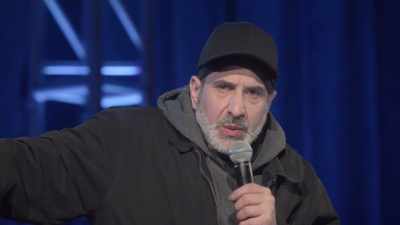 [audience laughing] - Dave Attell: Hot Cross Buns