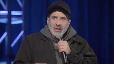 [audience laughing] - Dave Attell: Hot Cross Buns