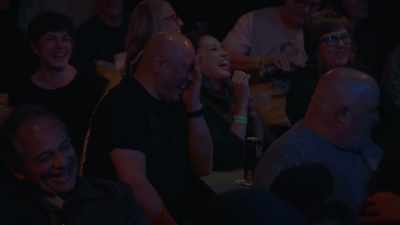 [audience laughing] - Dave Attell: Hot Cross Buns