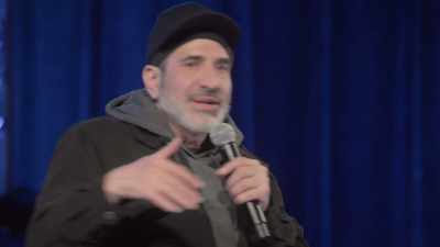 [audience laughing] - Dave Attell: Hot Cross Buns