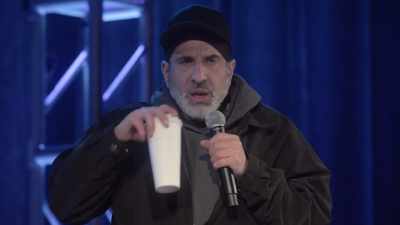 [audience laughing] - Dave Attell: Hot Cross Buns