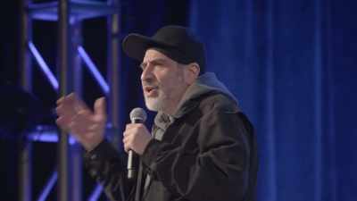 [audience laughing] - Dave Attell: Hot Cross Buns