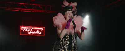 Aw, listen to me going on
about pink martinis with - Too Late
