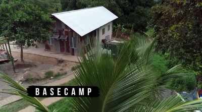 ‐ Back at base camp,
Bingo updates Peter and Martin - Lost Gold of World War II