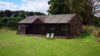 Back in the windless warmth
of my workshop, - James May and the Dull Men