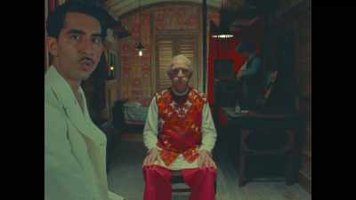 Backstage, I found Imdad
sitting quietly on a stool - The Wonderful Story of Henry Sugar