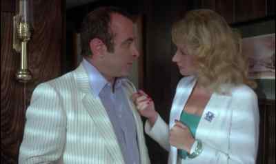 Bad luck putting the hat on the bed. - The Long Good Friday