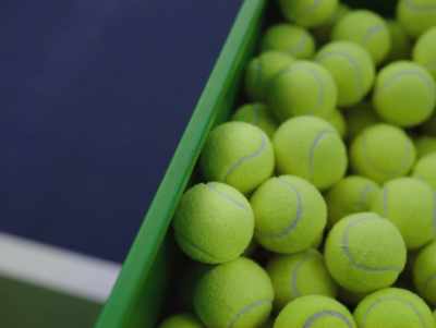 - [ball launcher fires]
- [racket stroke] - John and the Hole