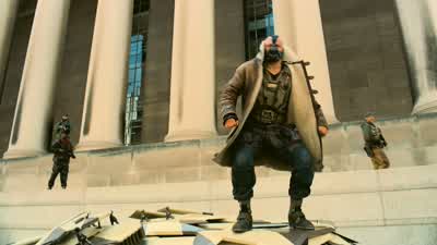 Behind you stands a symbol of oppressionBlackgate Prisonwhere a thousand men have languishedunder the name of this manHarvey DentWho has been held up to youas the shining example of justiceWe're just gonna keep moving you till we can get you in front of - The Dark Knight Rises
