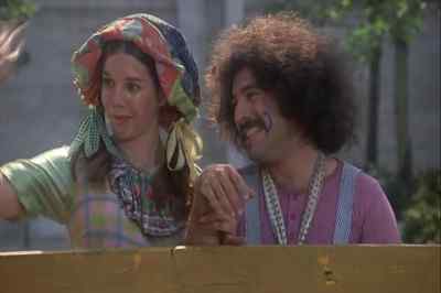 Bathing them in oil and wine. - Godspell