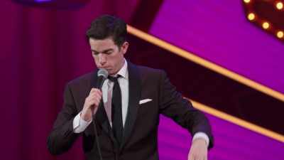 Because we have a travel--
She has a travel agent if-- - John Mulaney: Kid Gorgeous at Radio City