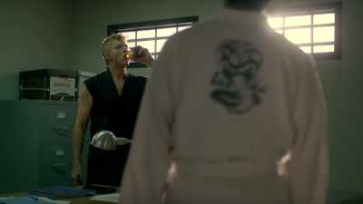 [beer cap pops] - Cobra Kai