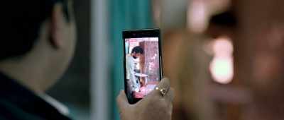 Behind the picture frame. - Mukkabaaz