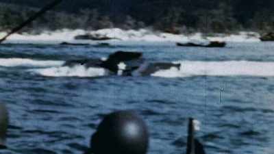 BEHIND THEM, MEN ARE
GETTING CUT INTO PIECES. - The Pacific War in Color