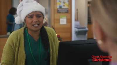 Belinda's the director
over there, - My Christmas Hero