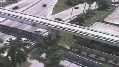 Below this overpass, 31-year-old Rudy Eugene rips his clothes off - Zombies! Prepping for the Apocalypse