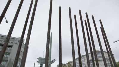 Beside it,
a row of metal stakes - Searching for Secrets