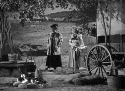 (Bessie) Better get
some wood for the fire. - In Old Oklahoma