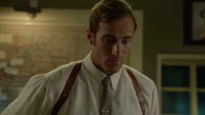 Between Kenneth Moore
and another man, - Ms Fisher's Modern Murder Mysteries