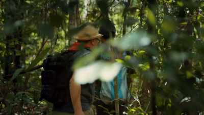 Beyond the pyramid,
Edwin spots more ruins. - Lost Treasures of the Maya