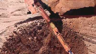 Big machines are one way.
Another is this. - Outback Opal Hunters