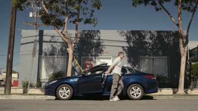 Black, four-door sedan... - Dirty John