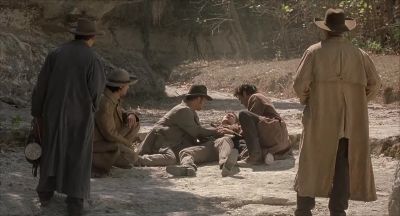 Bob get some bandages How's 'bout some whiskey - American Outlaws