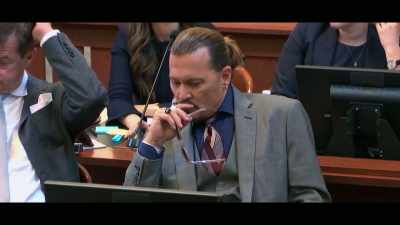 [bold classical music plays] - Depp V Heard