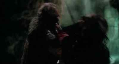 [both grunting] - The Sword and the Sorcerer