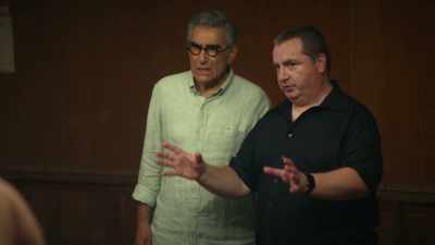 [both wrestlers clap] - The Reluctant Traveler with Eugene Levy