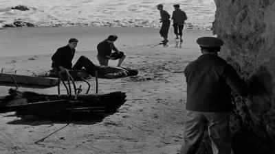 Boy: You guys get some
water to throw on him. - The Woman on the Beach