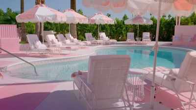 ...brand-new custom umbrellas.
We've got deckchairs, - Trixie Motel