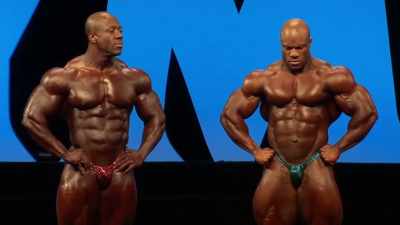 BRANDON:
Keeping Shawn at arm's reach. - Breaking Olympia: The Phil Heath Story