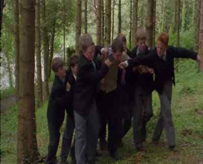 - Bring him to that tree, lads.
- Yeah, you maggot! - War of the Buttons