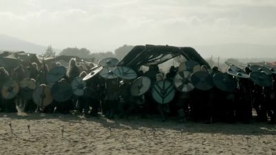 - Bring the cage and the ram!
- (All screaming) - Vikings