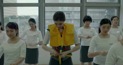 Bring the straps around
your waist and insert them - Lost Girls and Love Hotels