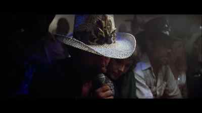 BUD HAD A 79
ON HIS FIRST GO-ROUND. - Urban Cowboy