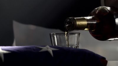 (bugle playing "Taps")
(man) PRESENT ARMS! - FlashForward