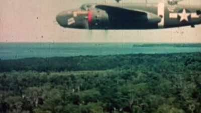 Bullets fly from nose
guns with telltale sparks. - The Pacific War in Color